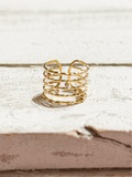 Anillo acero dorado baño cinco vueltas circonitas