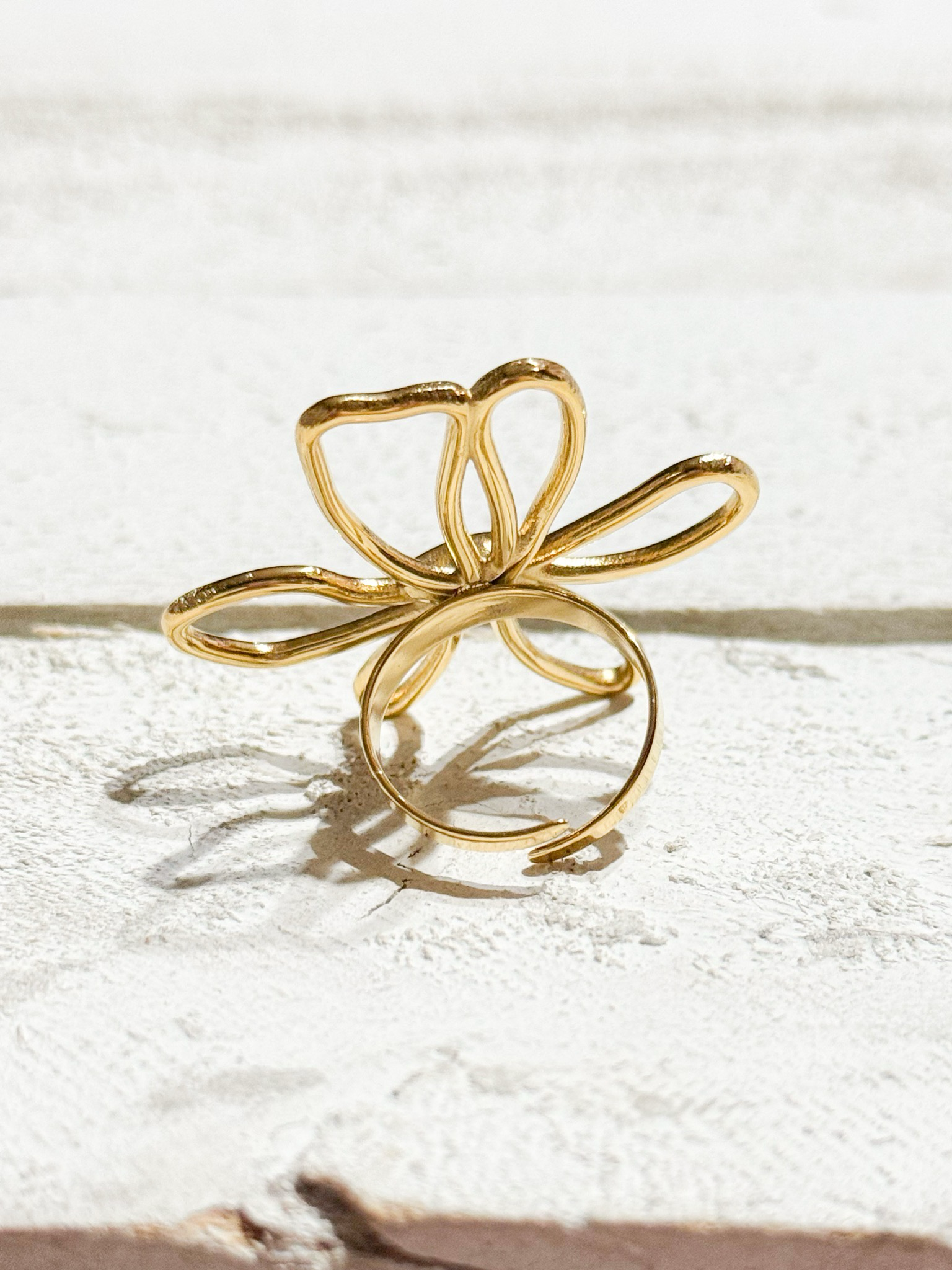 Anillo flor garabato