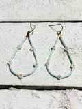 Pendientes gota margaritas agua