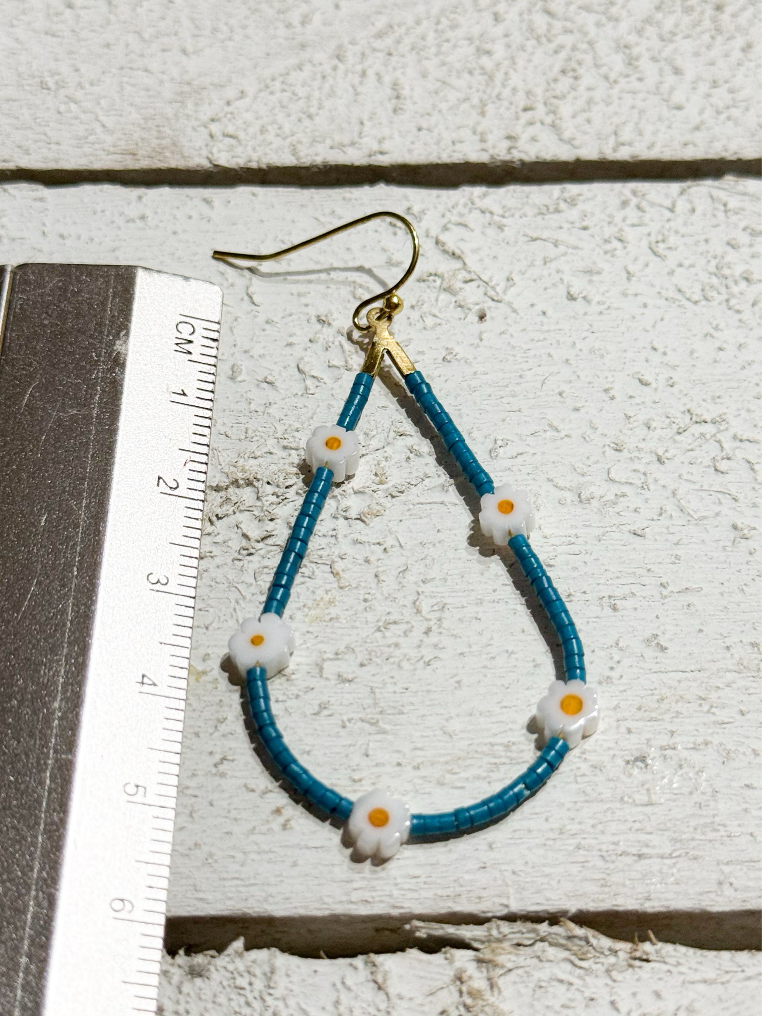 Pendientes gota margaritas azul plomo