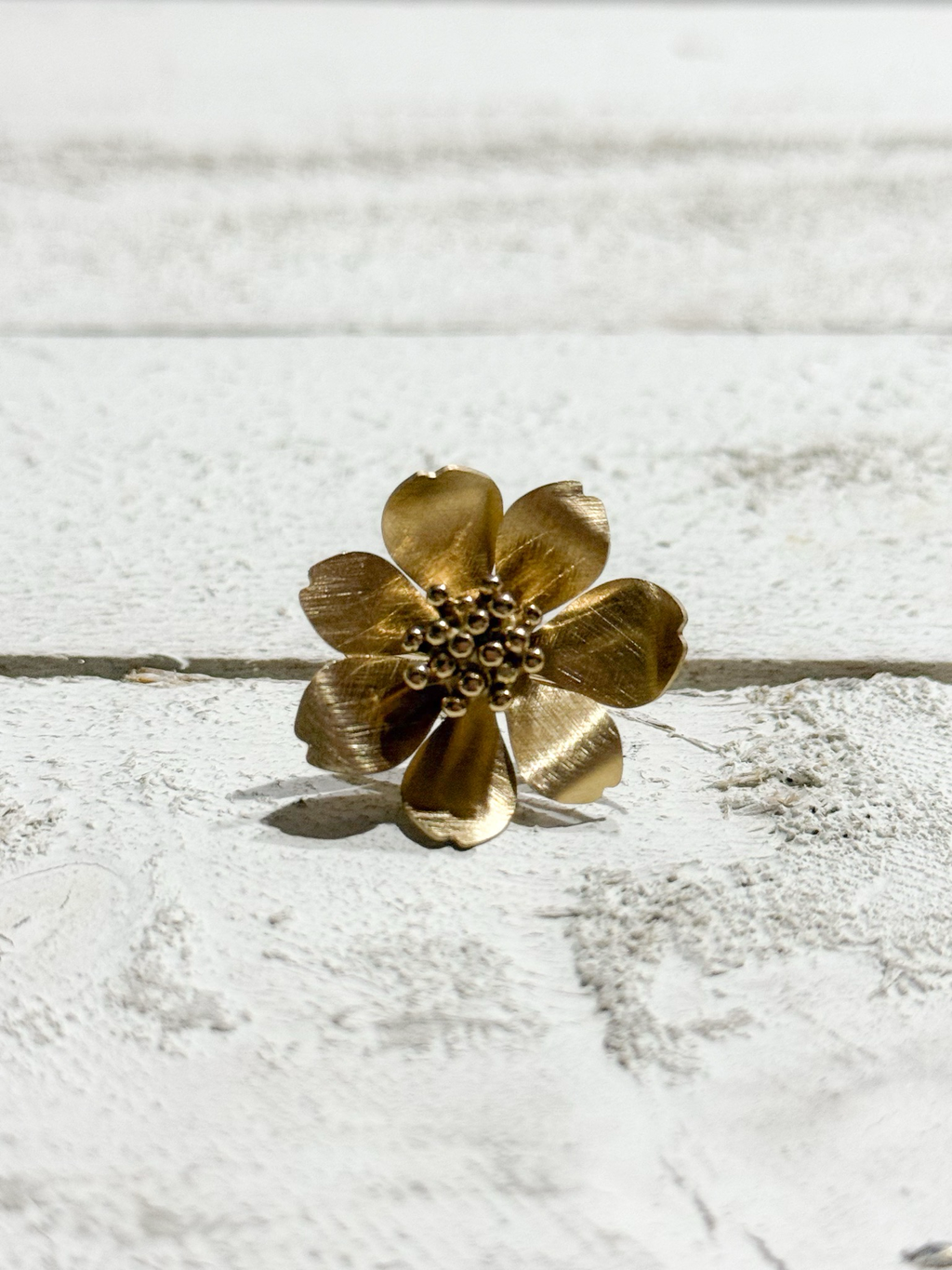 Anillo flor acero