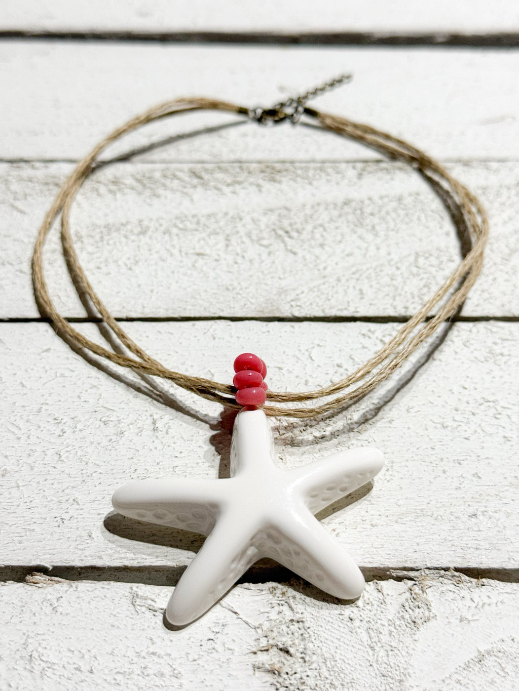 Gargantilla estrella cáñamo rosa