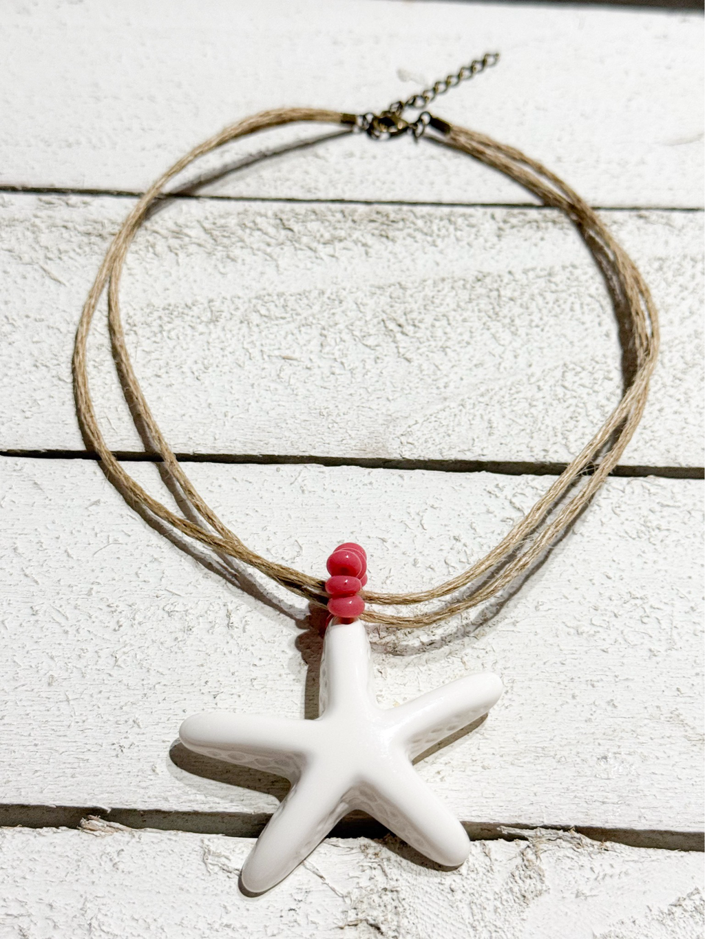 Gargantilla estrella cáñamo rosa