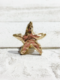 Anillo estrella dorada elástico
