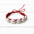 Pulsera conchas cuerda fresa