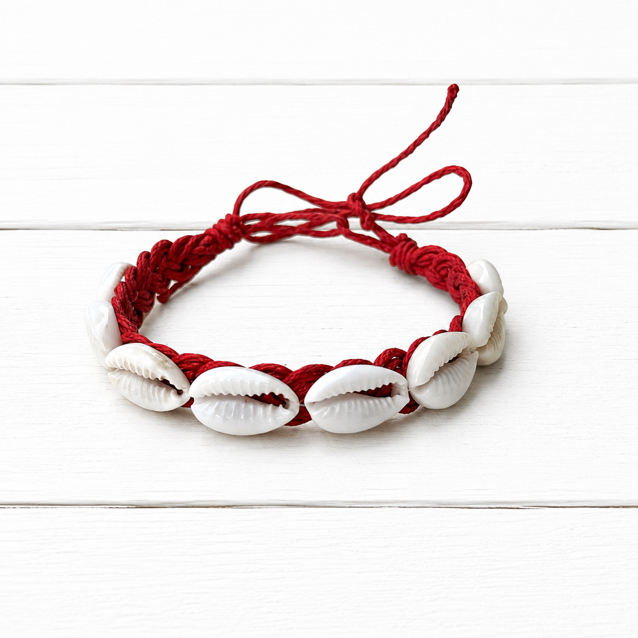 Pulsera conchas cuerda fresa