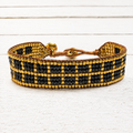 Pulsera egipcia negra y dorada
