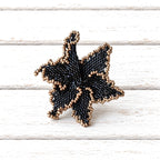 Anillo flor Miyuki negro