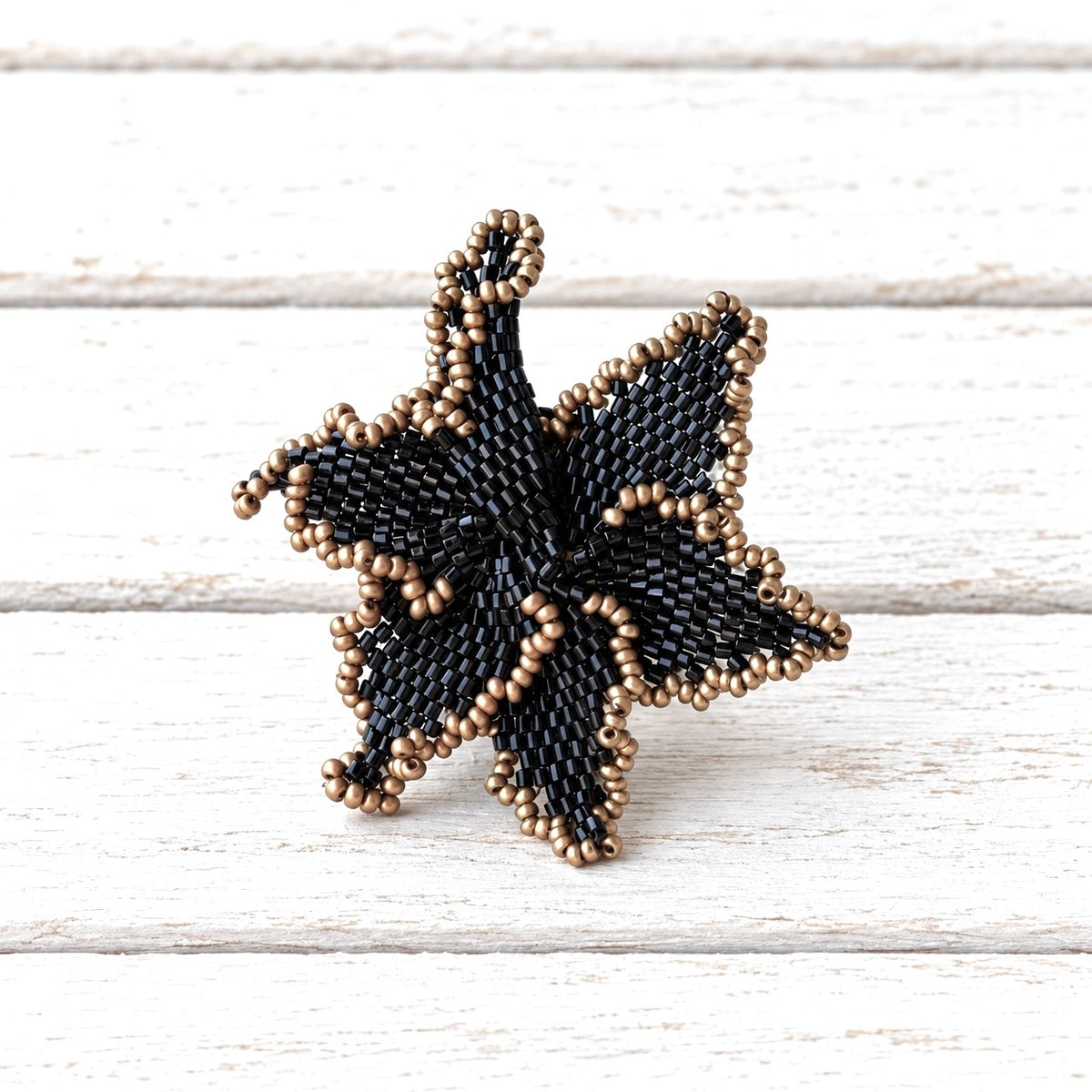 Anillo flor Miyuki negro