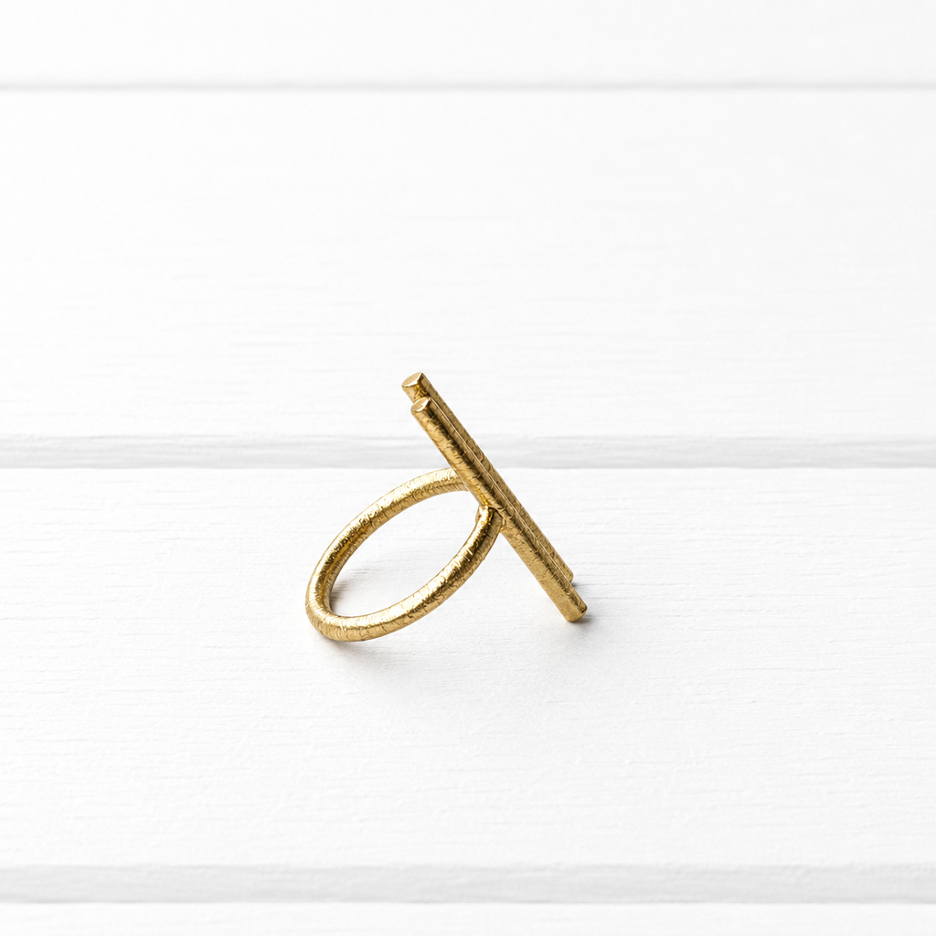 Anillo doble barra dorado
