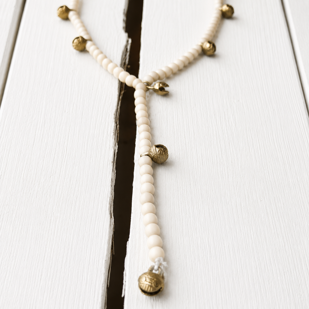 Collar natural cascabeles