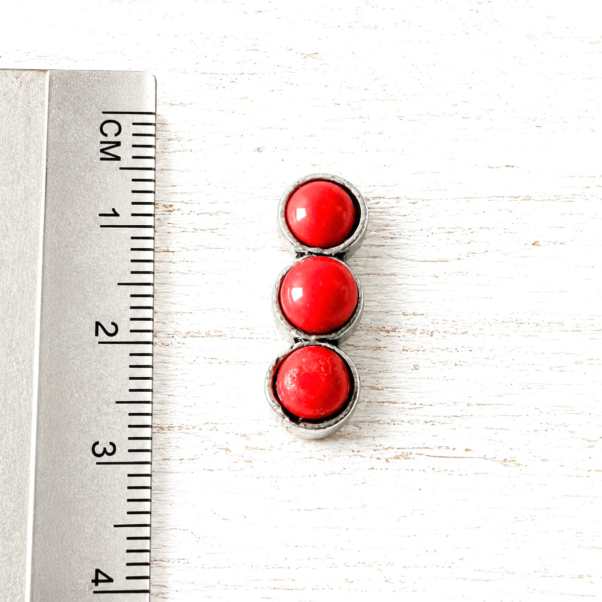 Pendientes tres piedras rojas