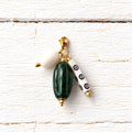 Charm vidrio verde botella