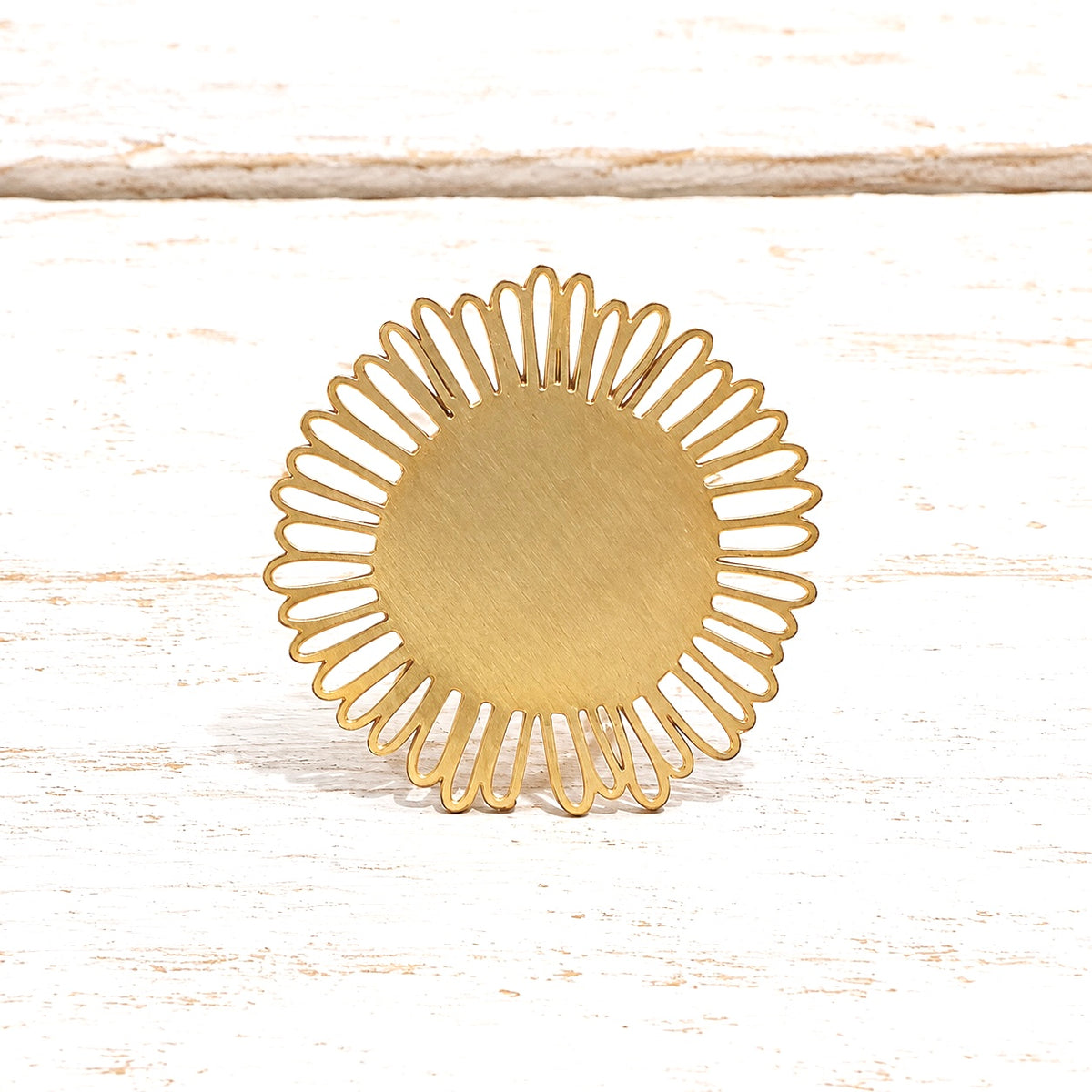 Anillo flor acero dorado mate