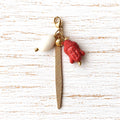 Charm cabeza naranja