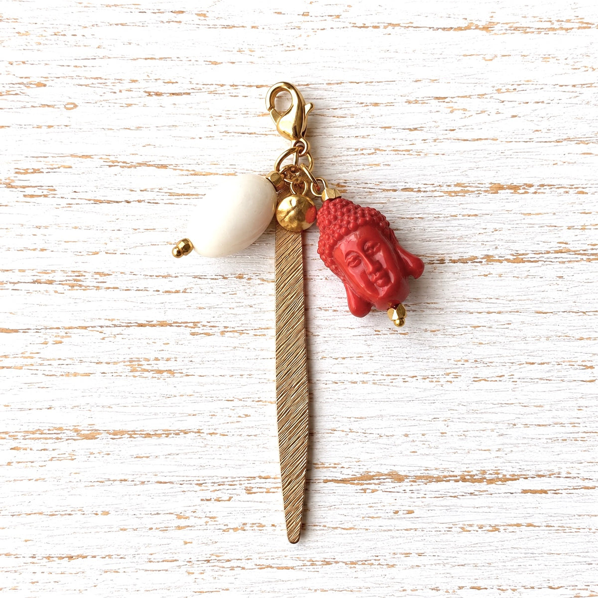 Charm cabeza naranja