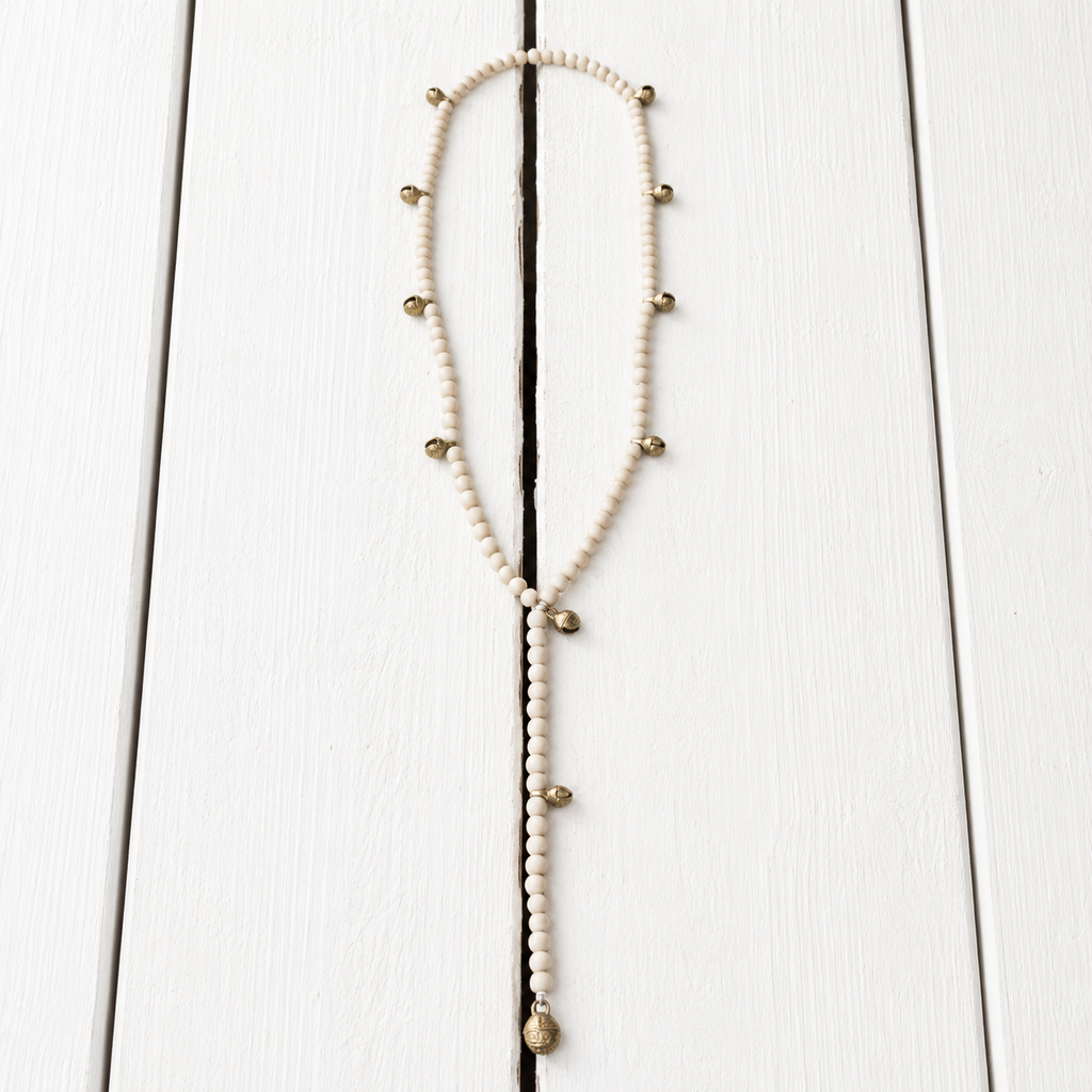 Collar natural cascabeles