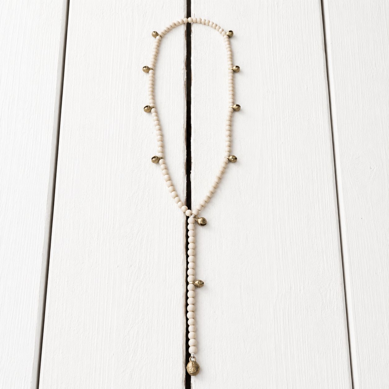 Collar natural cascabeles