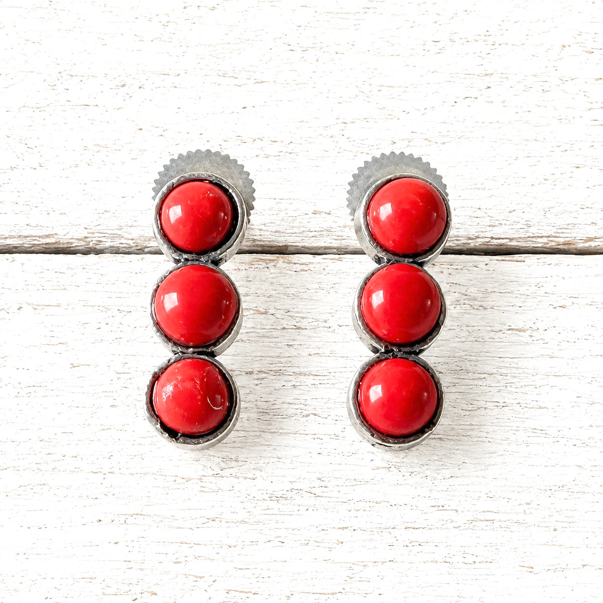 Pendientes tres piedras rojas