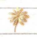 Broche flor