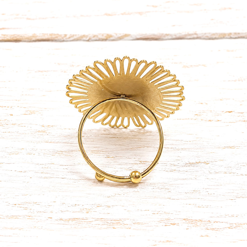 Anillo flor acero dorado mate