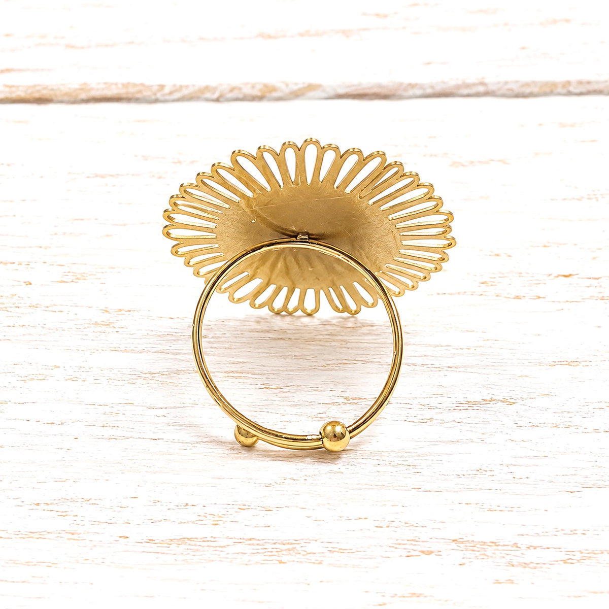 Anillo flor acero dorado mate