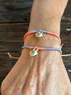 Pulsera cascabel lavanda/naranja
