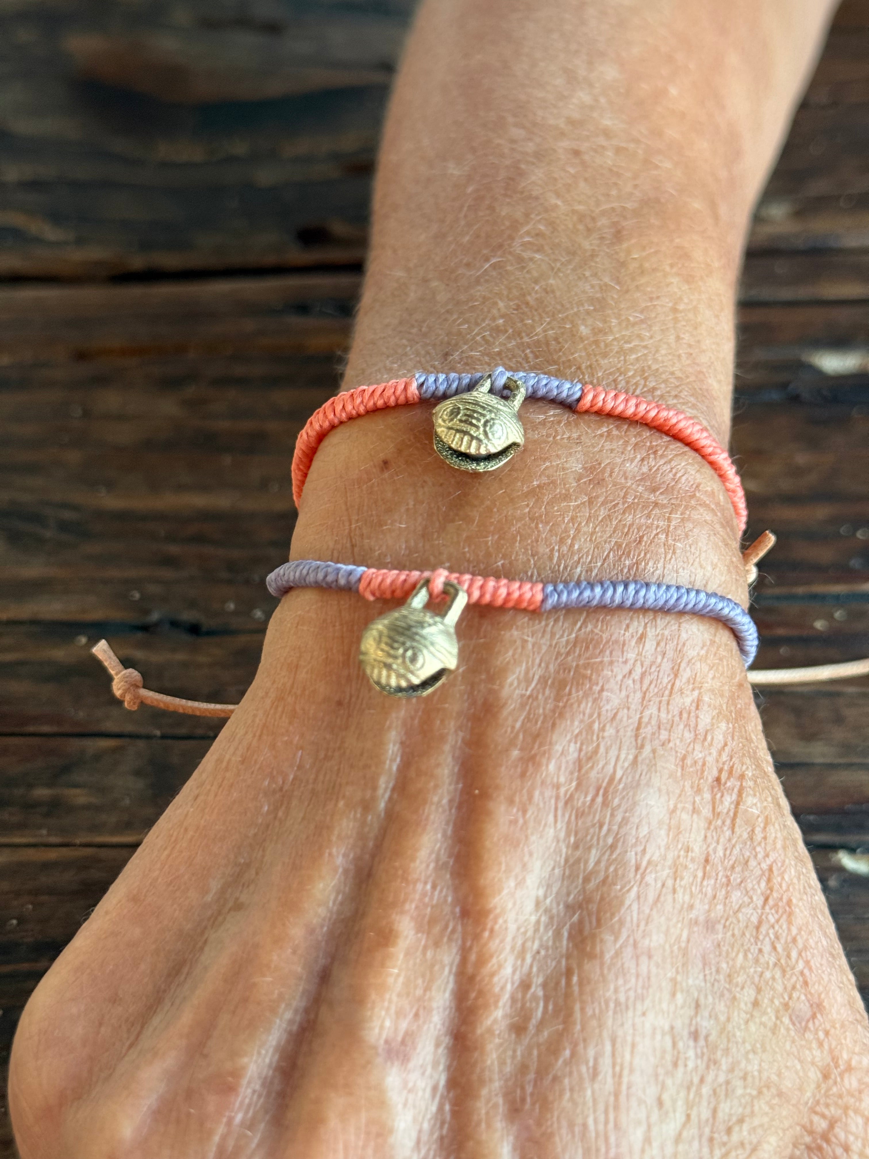 Pulsera cascabel lavanda/naranja