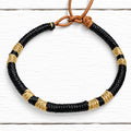 Pulsera cuero negro dorado