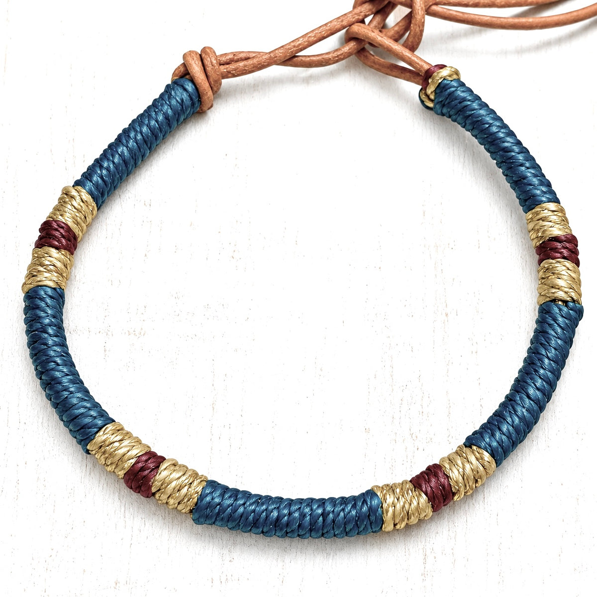Pulsera cuero dorado plomo