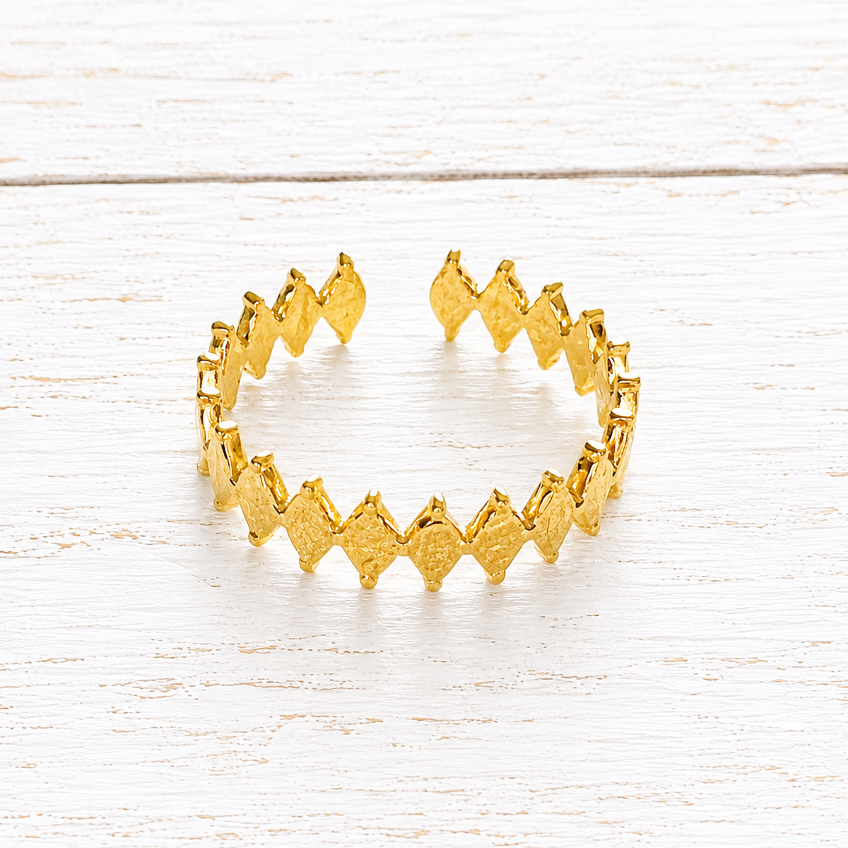 Anillo acero dorado fino rombos