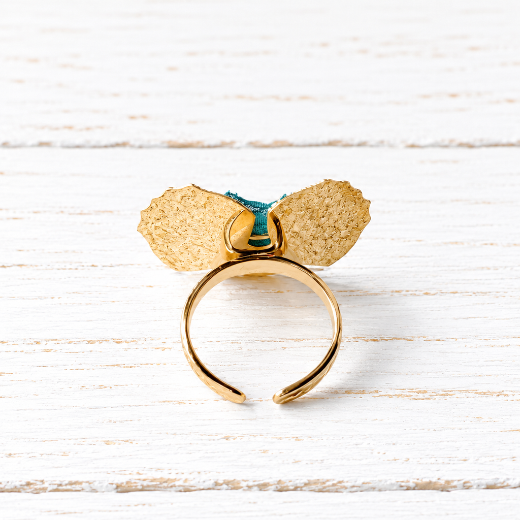 Anillo flor tela