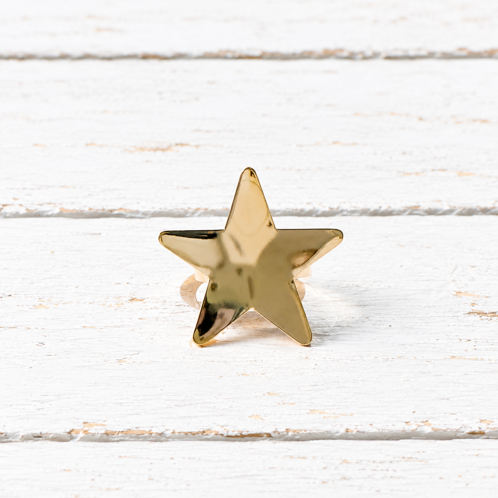 Anillo acero dorado estrella