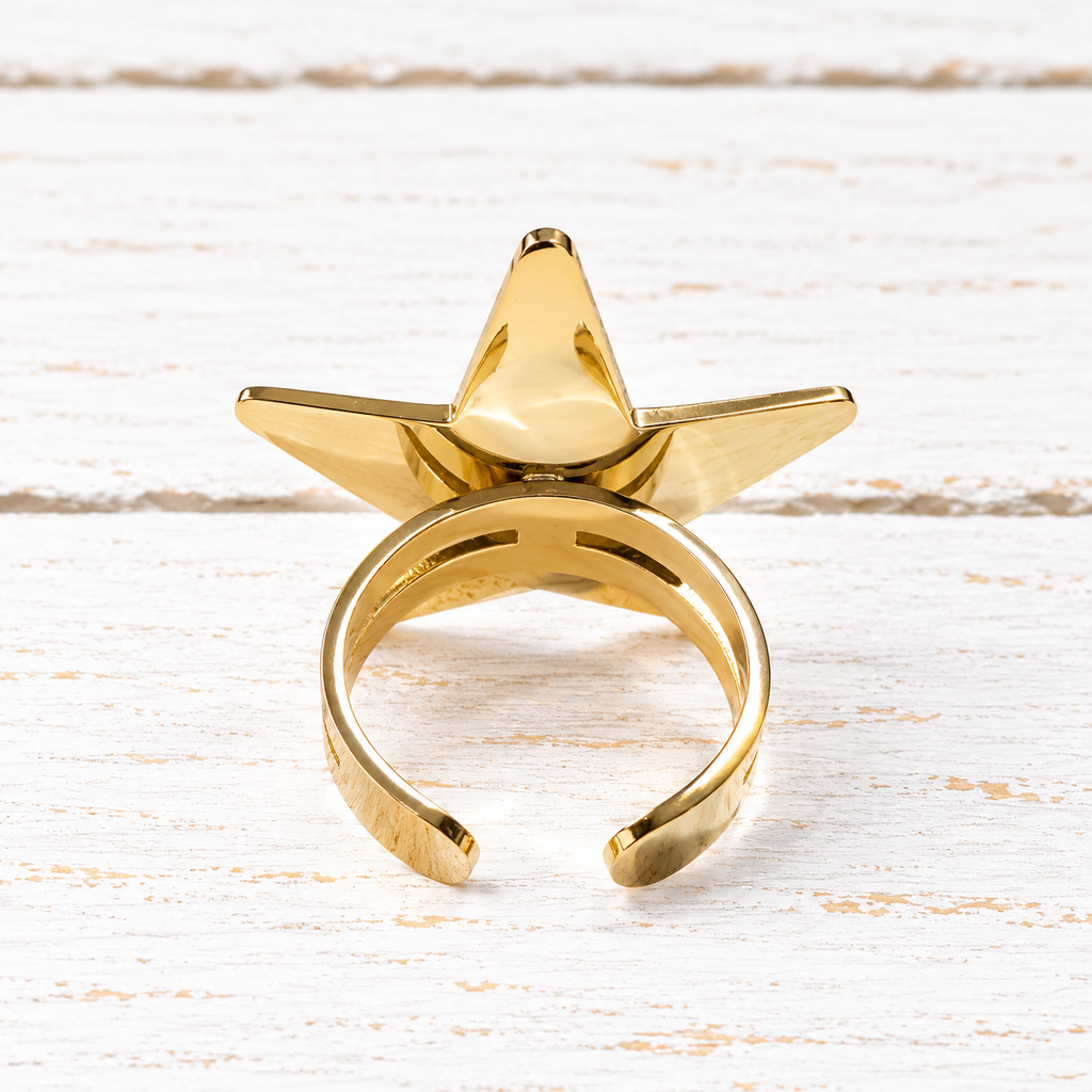 Anillo acero dorado estrella