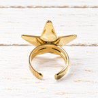 Anillo acero dorado estrella
