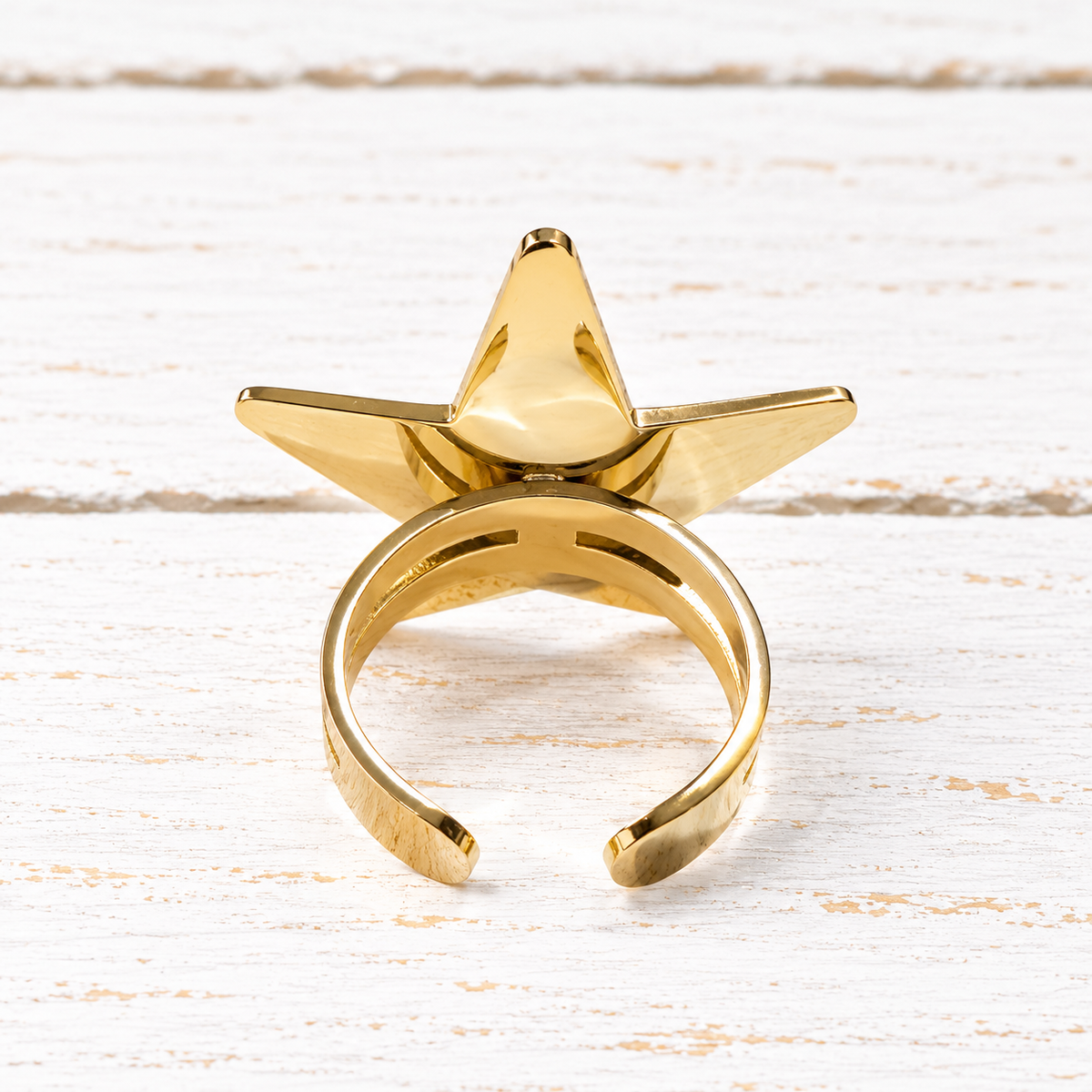 Anillo acero dorado estrella