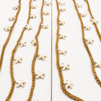 Collar tejido estrellas
