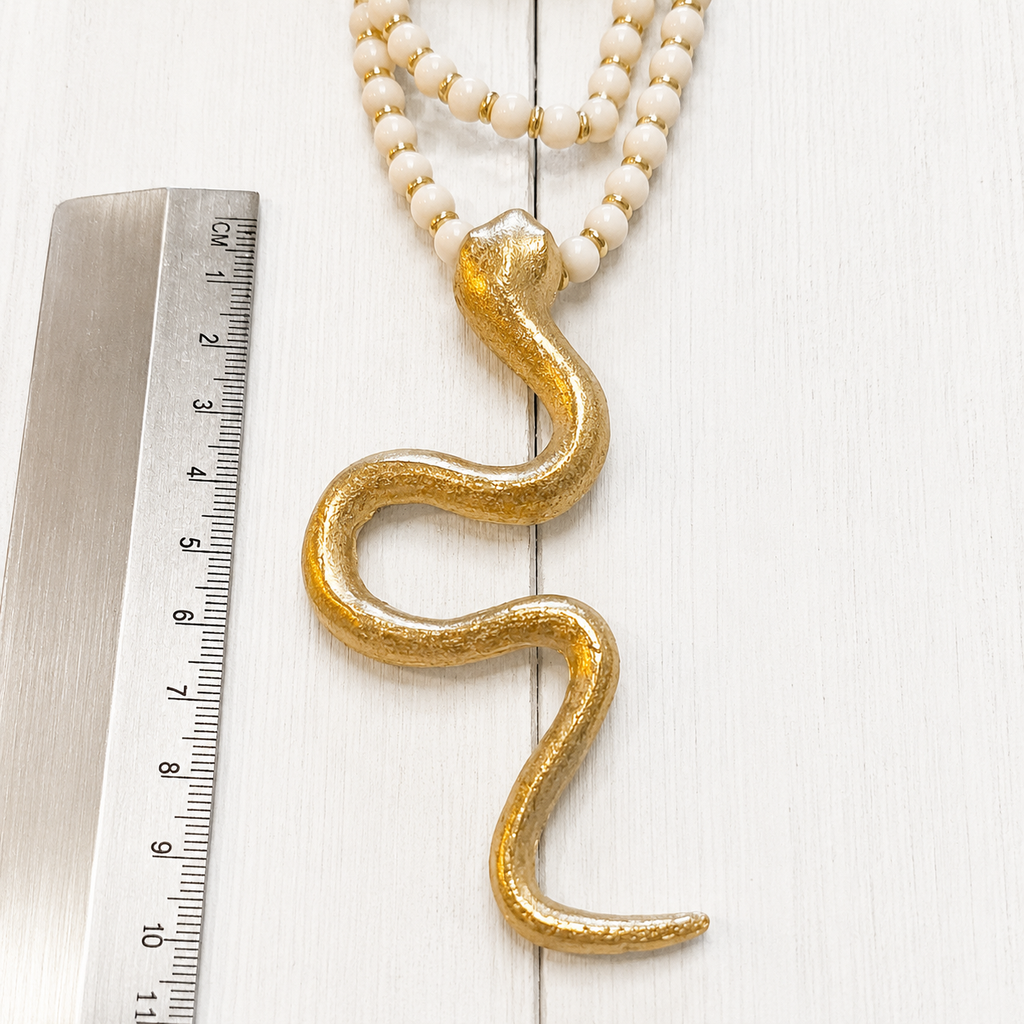 Collar natural serpiente bronce dorada