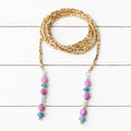 Collar abierto extra largo dorado piedras