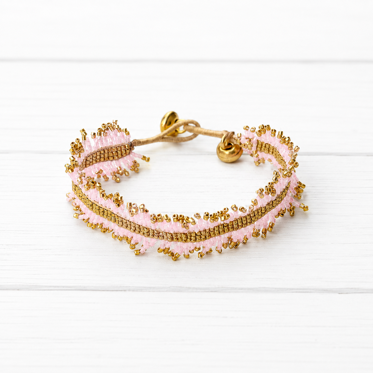 Pulsera miyuki flecos rosa