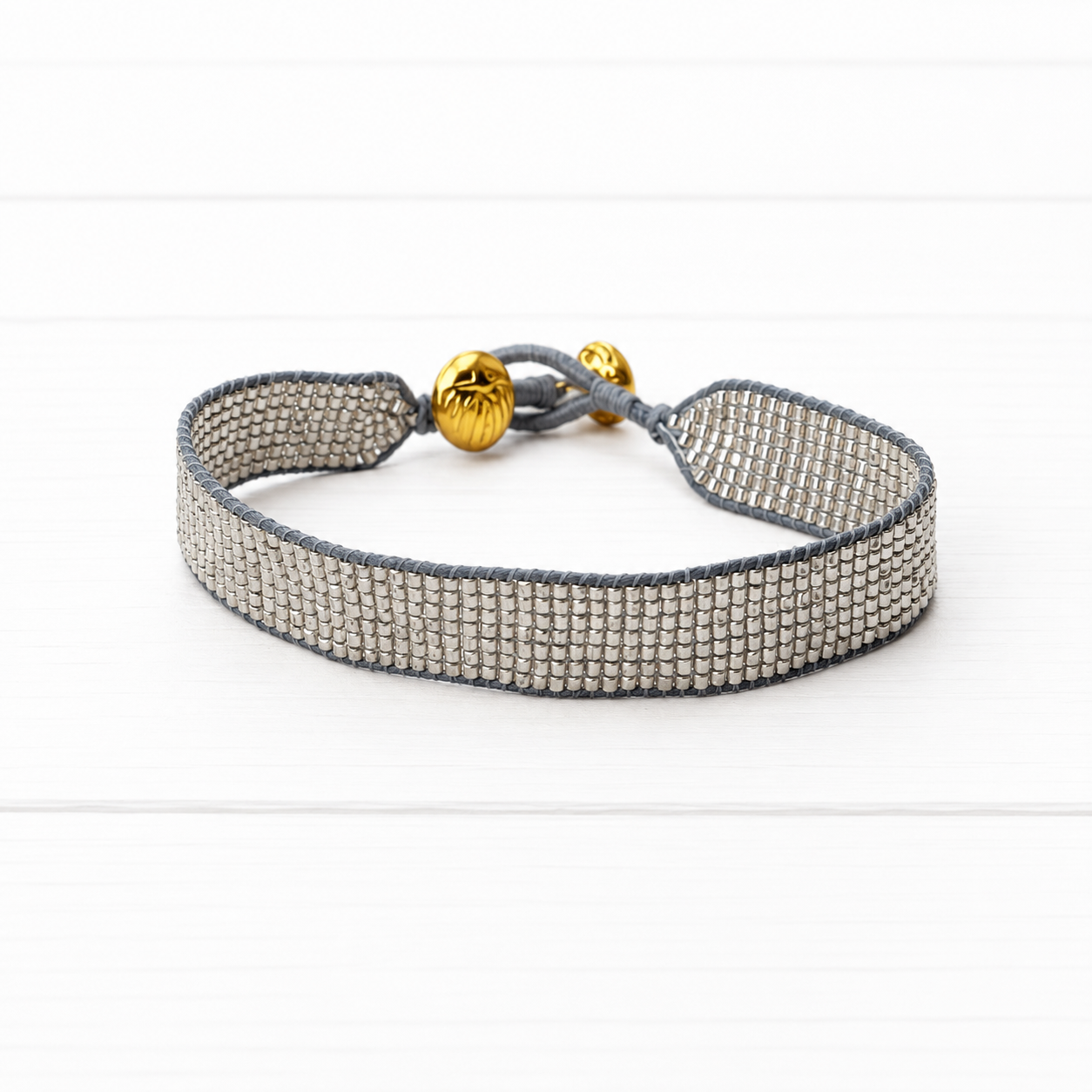 Pulsera miyuki 1cm cuerda gris