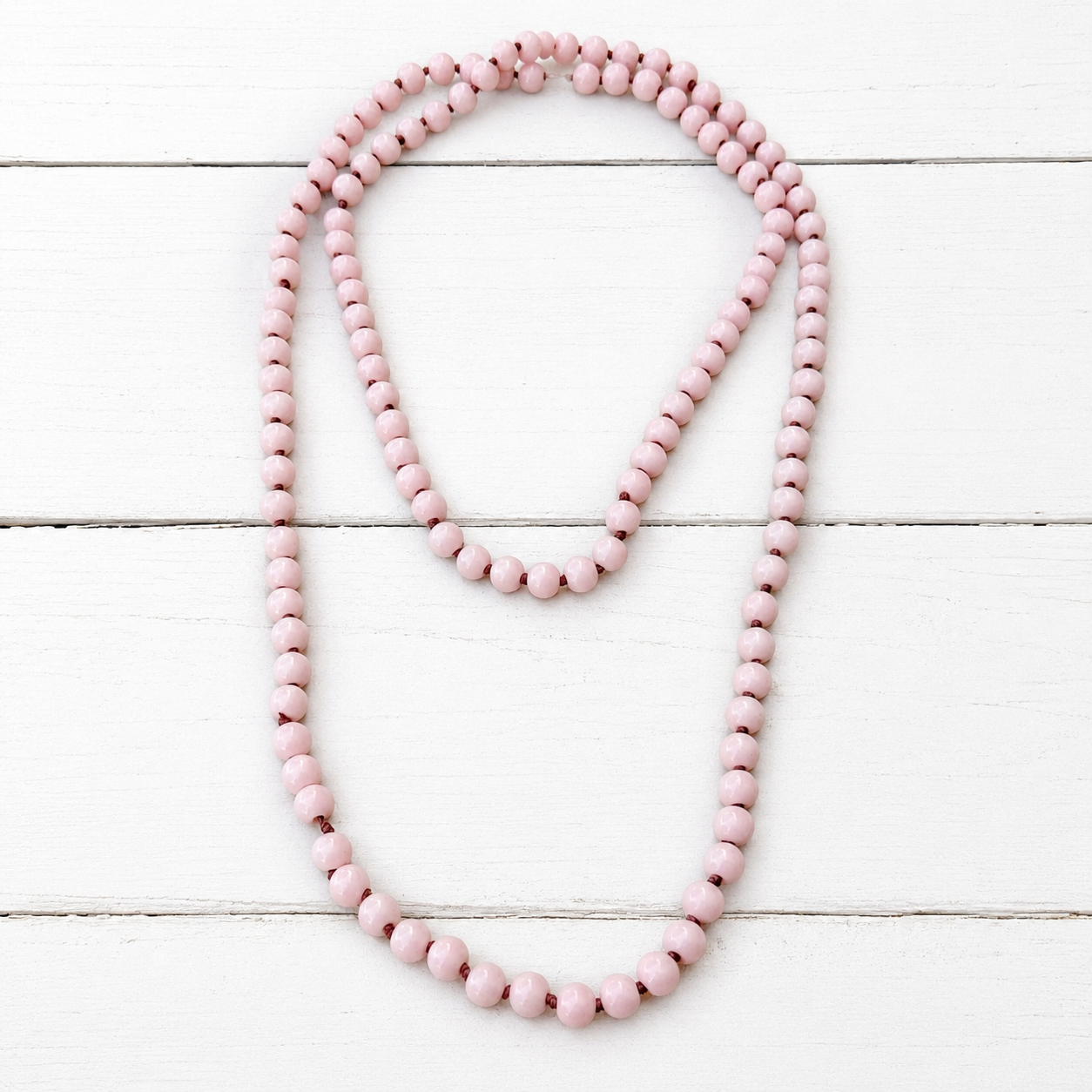 Collar nudos rosa claro