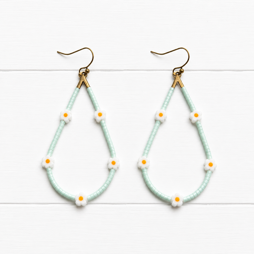 Pendientes gota margaritas agua