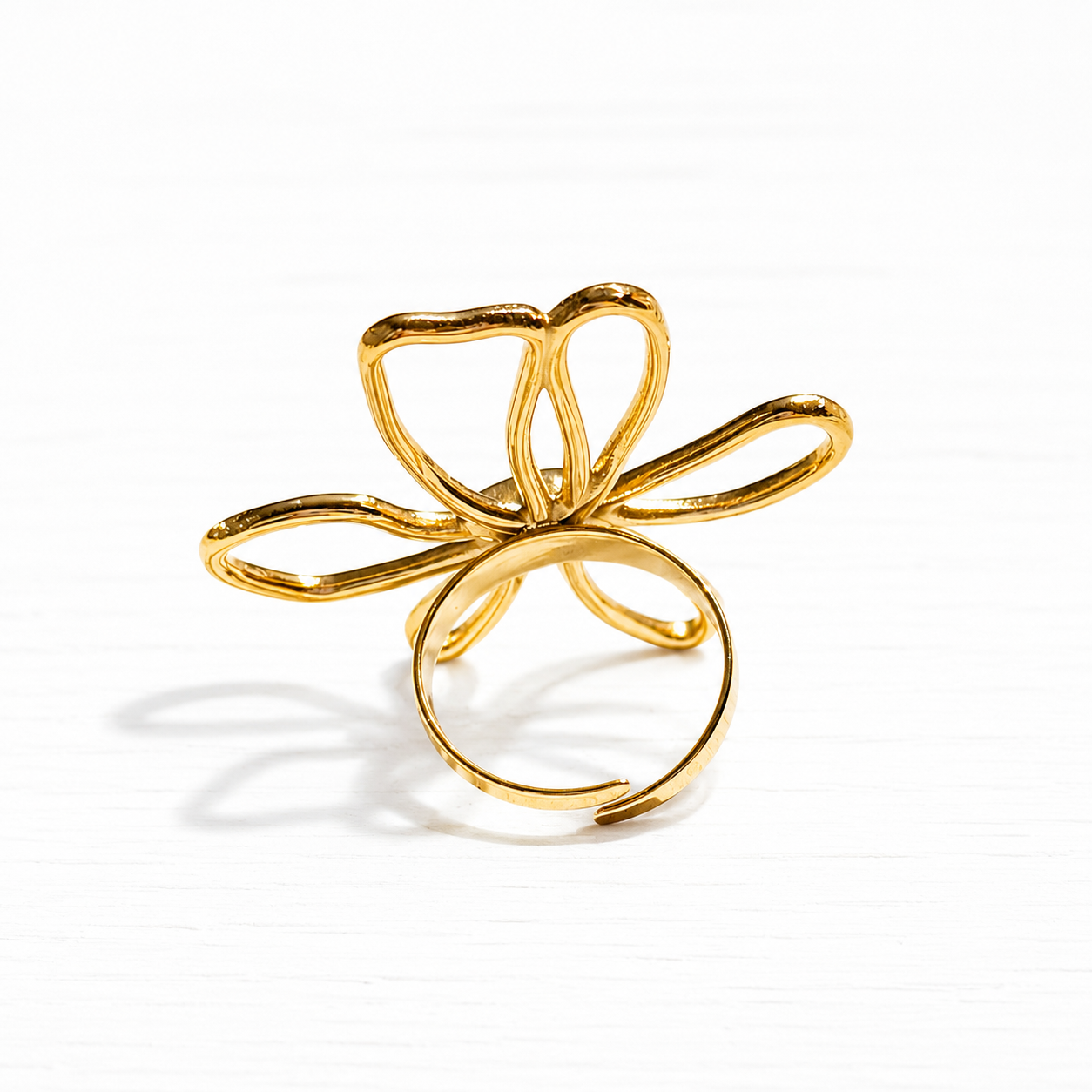 Anillo flor garabato