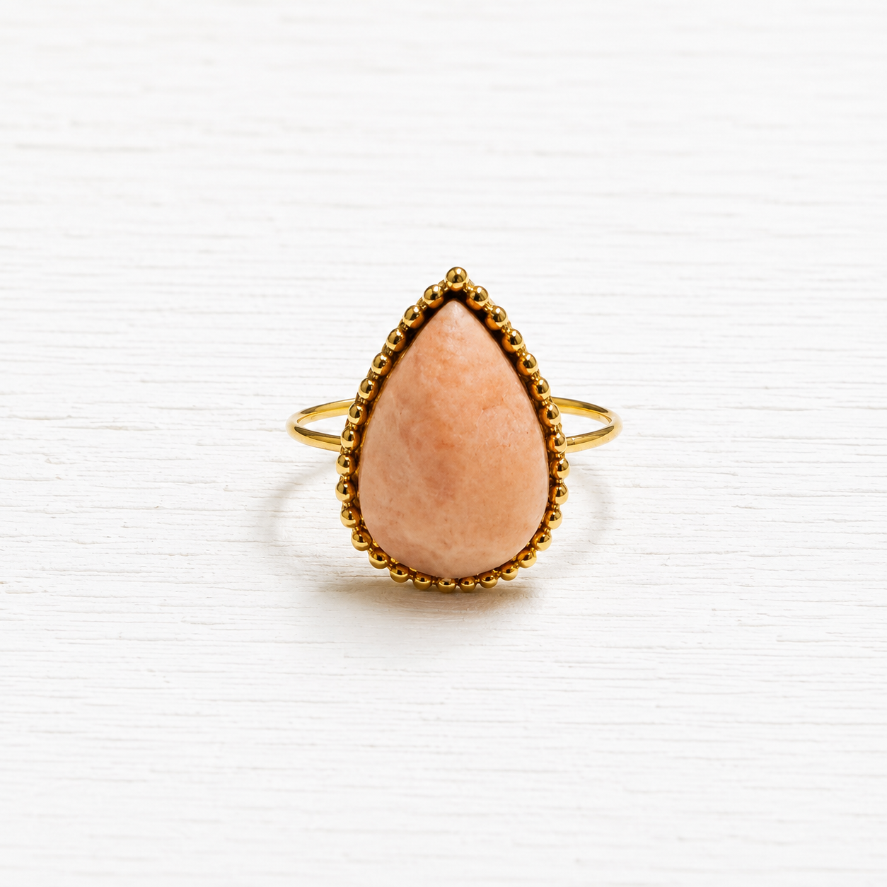 Anillo gota piedra sol facetada