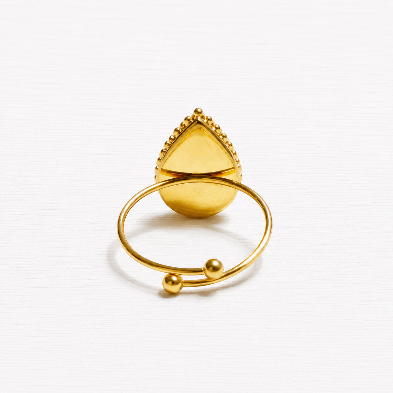 Anillo gota piedra sol facetada