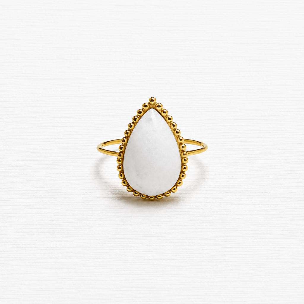 Anillo gota piedra blanca facetada