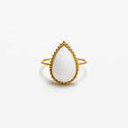 Anillo gota piedra blanca facetada