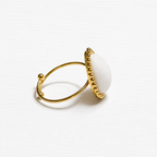Anillo gota piedra blanca facetada