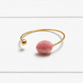 Anillo abierto piedra rosa rodocrosita acero dorado